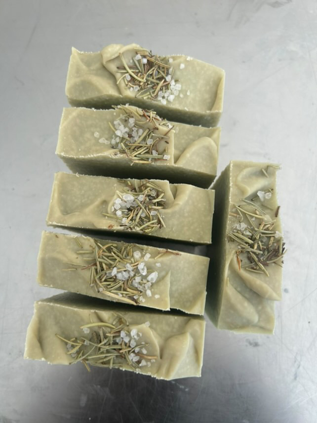 lots of bars of green rosemary and sea salt soap