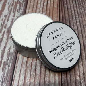 Open aluminium tub of whipped aloe & prickly pear tallow butter