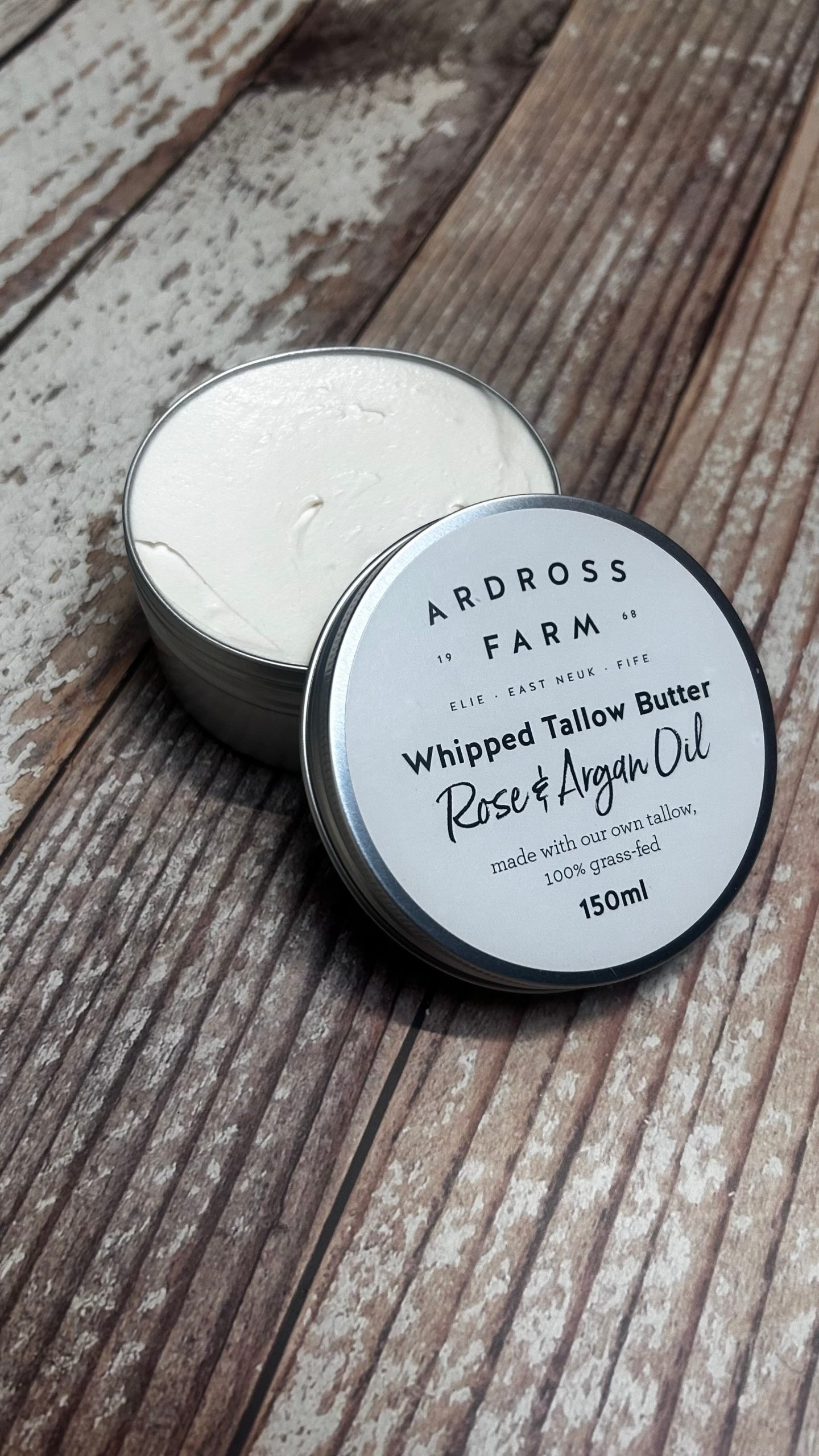 Open tin of tallow butter